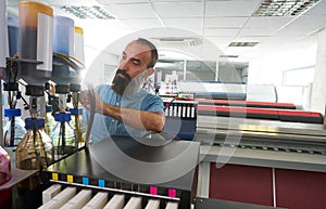 Espertise man in transfer printing industry plotter