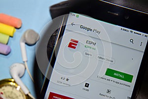 ESPN dev app with magnifying on Smartphone screen.