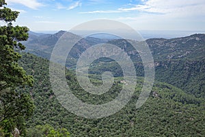 Esporles, Spain - 11 June, 2023: Views of the Tramuntana Mountains from the GR221 trail, Esporles, Mallorca photo