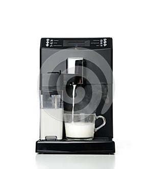 Espresso and americano coffee machine maker steaming milk for a latte or cappuccino preparation process