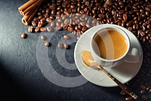Espresso coffee With coffee beans in the morning background