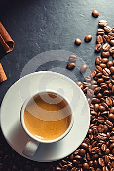 Espresso coffee With coffee beans in the morning background