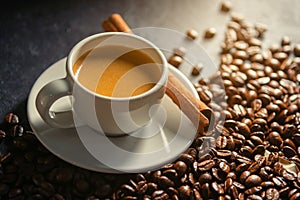 Espresso coffee With coffee beans in the morning background