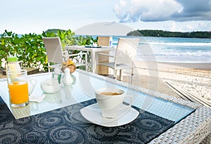 Espresso Coffee cup by the beach.