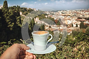 Espresso coffee over cityscape of Florence, Italy. Traveler breakfast in Tuscany