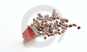 Espresso coffee pod and coffee beans on white background, Closeup view with details