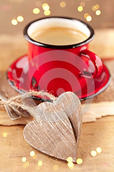 Espresso coffee, red enamel mug, two hearts
