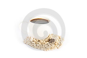 Espresso coffee on white coffee beans