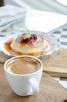 Espresso coffee in a white cup on the table.