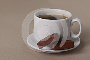 Espresso cup and chocolates