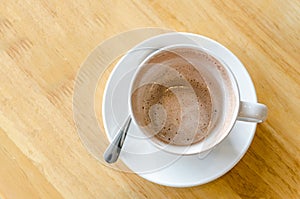 Espresso cup on wood surface