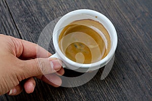 Espresso double shot on wood background