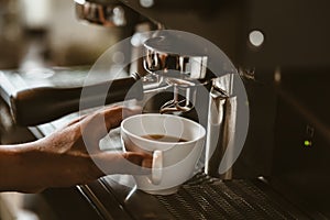 espresso machine in coffee shop counter offering freshly brewed coffee. coffee maker concept