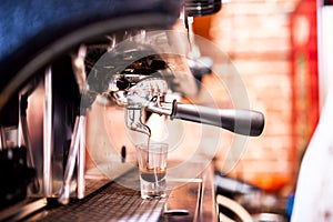 Espresso machine making coffee photo