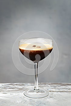 Espresso martini cocktail with brown foam
