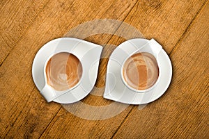 Espresso on wooden background photo