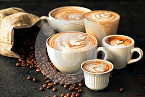 Espressos espressing  in artistic latte form photo