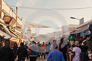 ESSAOUIRA, MOROCCO - NOVEMBER 18: traditional souk with walking people in medina Essaouira. The complete old town of