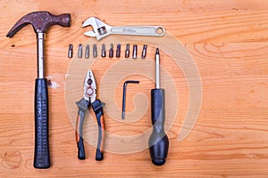 Essential basic tools set consisting hammer, plier, screwdriver,