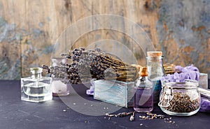 Essential lavender oil and dry lavender flowers.