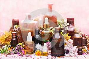 Essential oil bottles, medicinal flowers and herbs