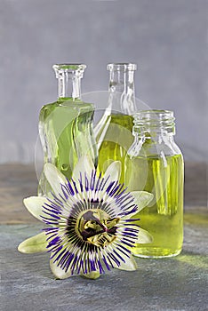 Essential oil bottles with a passion flower