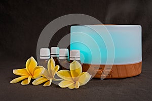 Essential oil diffuser with turqoise light photo