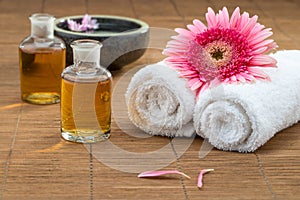 essential oil, flower on towel, flower float on water fore healthy spa