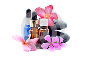 Essential oil with flower and Zen Stone