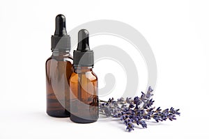 Essential oil in a glass bottle with a pipette.