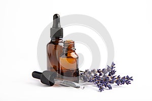 Essential oil in a glass bottle with a pipette.