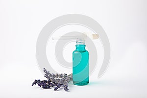 Essential oil in a glass bottle with a pipette.