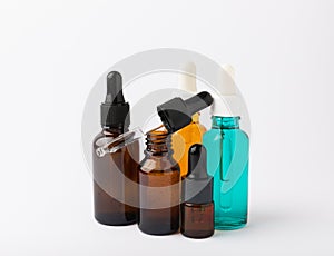 Essential oil in a glass bottle with a pipette.