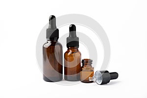 Essential oil in a glass bottle with a pipette.