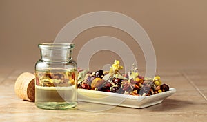 Essential oil or herbal tincture in a small glass bottle