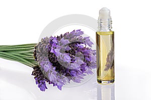 Essential oil and lavender flowers