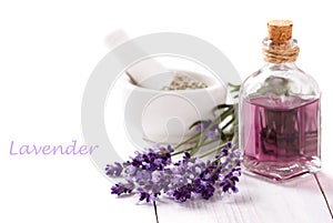 Essential oil and lavender flowers