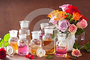 Essential oil and rose flowers aromatherapy spa perfumery photo