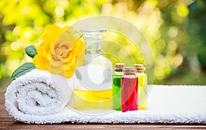 Essential oil and a soft white towel. Spa concept. Aromatherapy and massage.