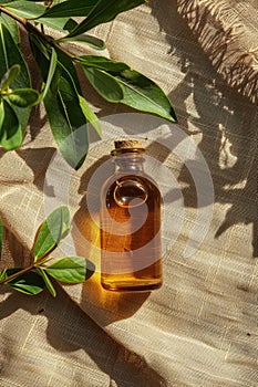 essential oil of tea tree on the background of burlap top view