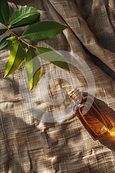 essential oil of tea tree on the background of burlap top view