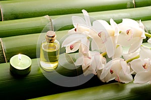 Essential oil and white orchid