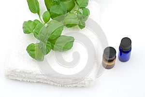 Essential oil and white towel