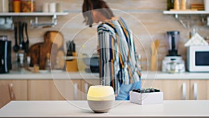 Essential oils diffuser distributing aromatherapy