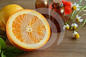 Essential oils with fruits photo
