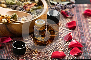 Essential oils with roses and herbs