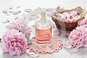 Essential rose aroma oil for massage and aromatherapy