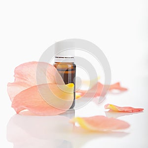 Essential rose oil in brown vial