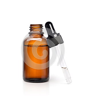 Essential serum oil in amber dropper bottle