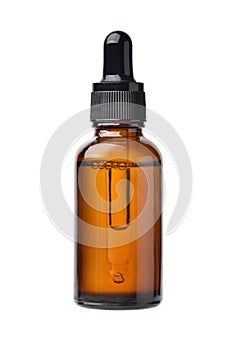 Essential serum oil in amber dropper bottle